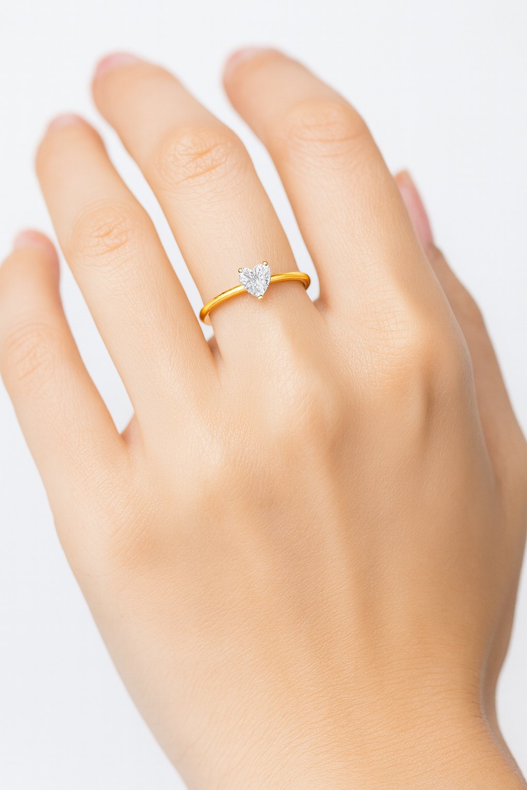 Gold Ring with Heart-Shaped Center Stone