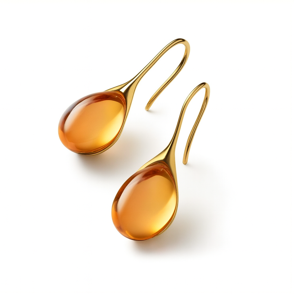 Gold teardrop earrings with amber gemstones, elegant jewelry design, luxury fashion accessories, perfect for formal occasions and gift ideas.