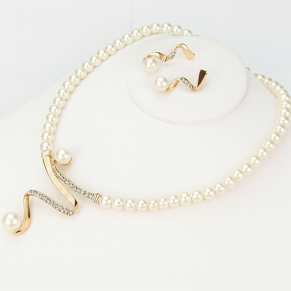 Pearl bracelet with gold accents on a white background