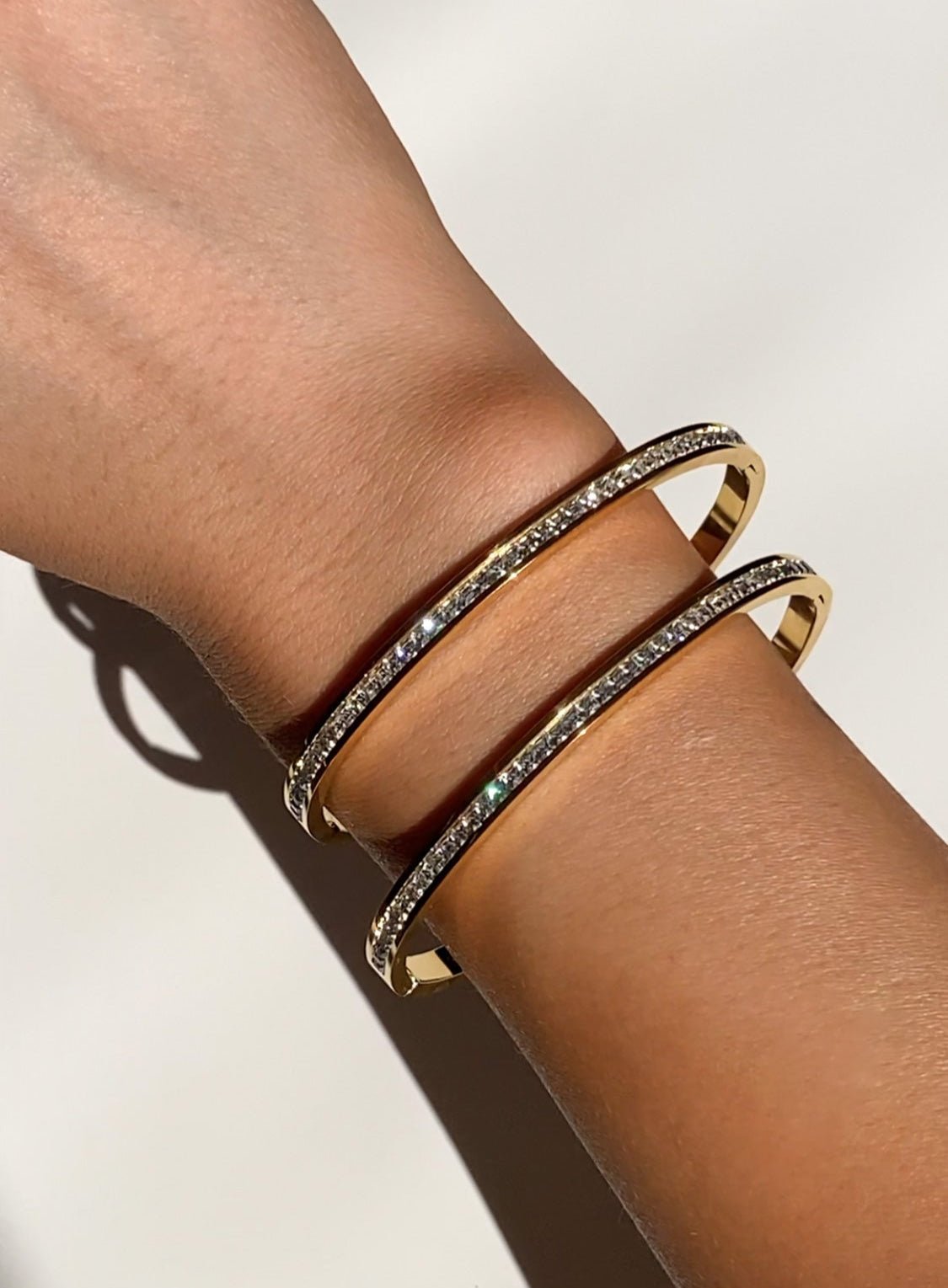 Gold-Tone Bangle Bracelet with Clear Pavé Detailing