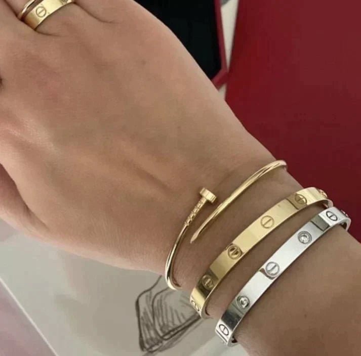 Polished Gold Bangle with Engraved Circular Detailing