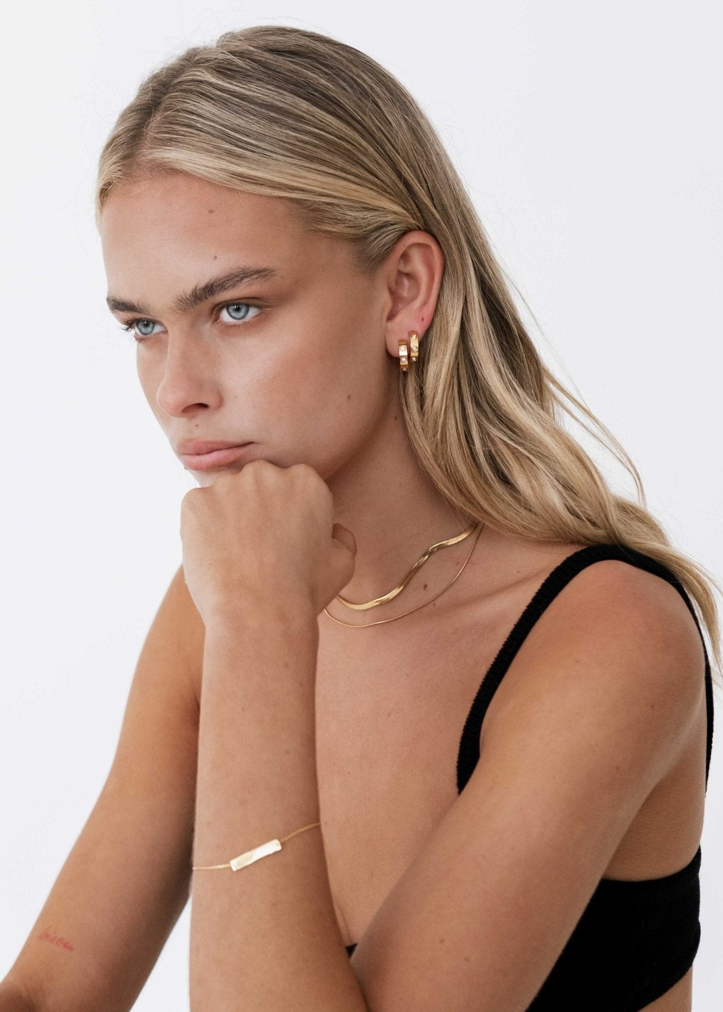 Gold Mini Hoop Earrings with Crystal Accents – Polished Small Statement Jewelry