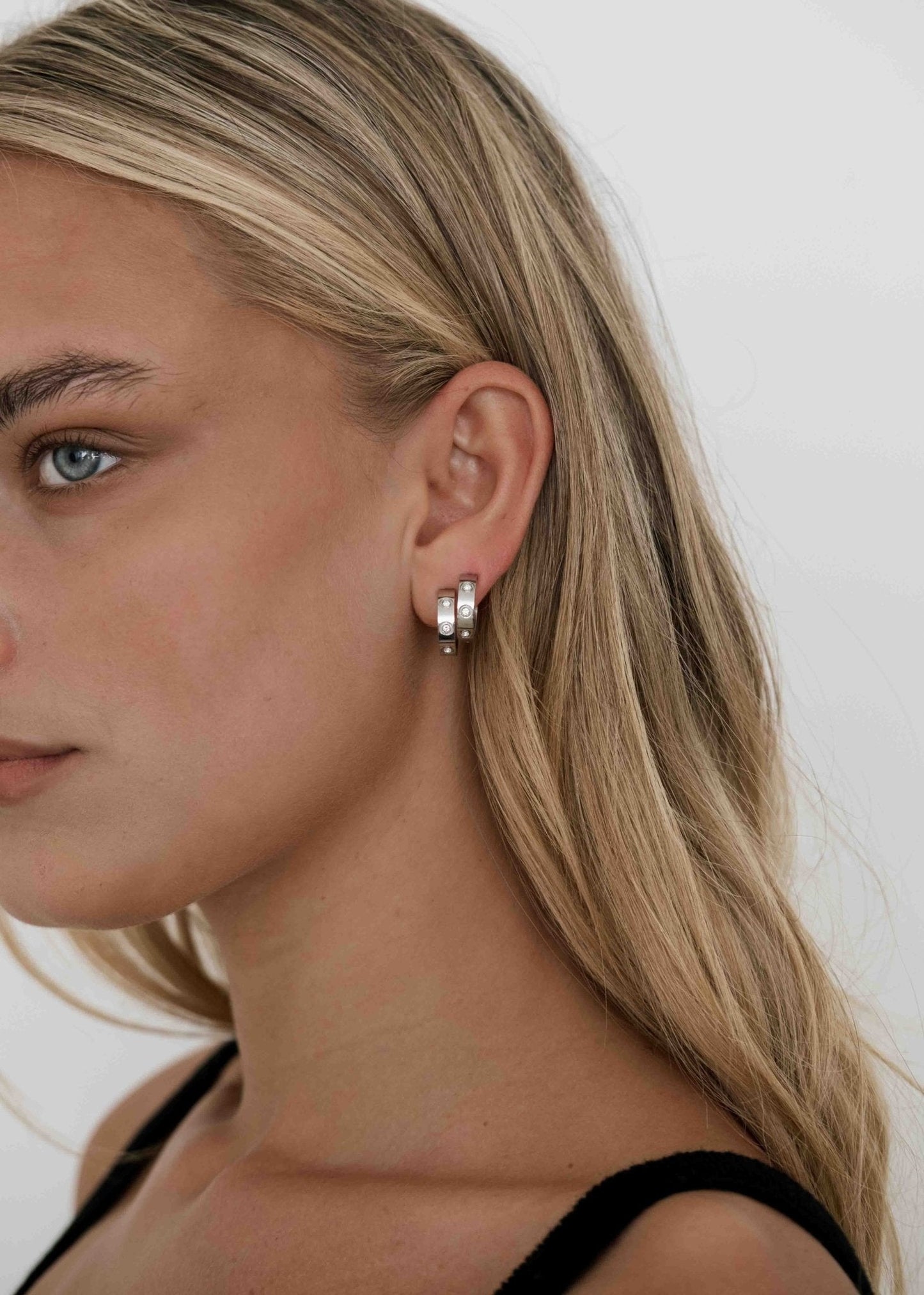 Silver Studded Hoop Earrings – Minimalist Half Hoops with Crystal Details