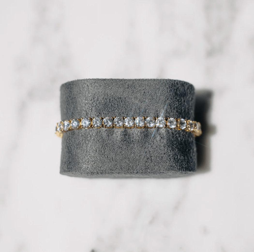 Gold Tennis Bracelet with Round-Cut Clear Stones