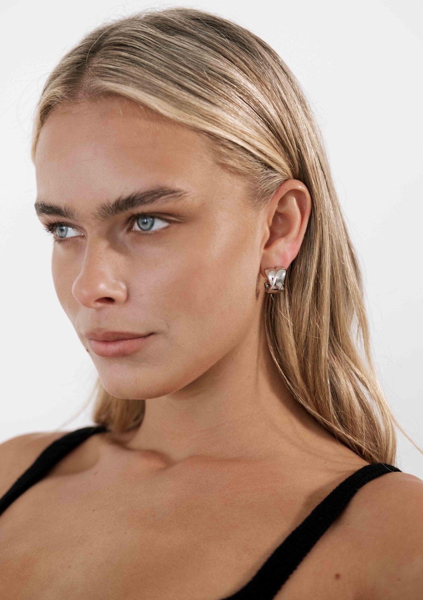 Twisted Dome Hoop Earrings in Silver