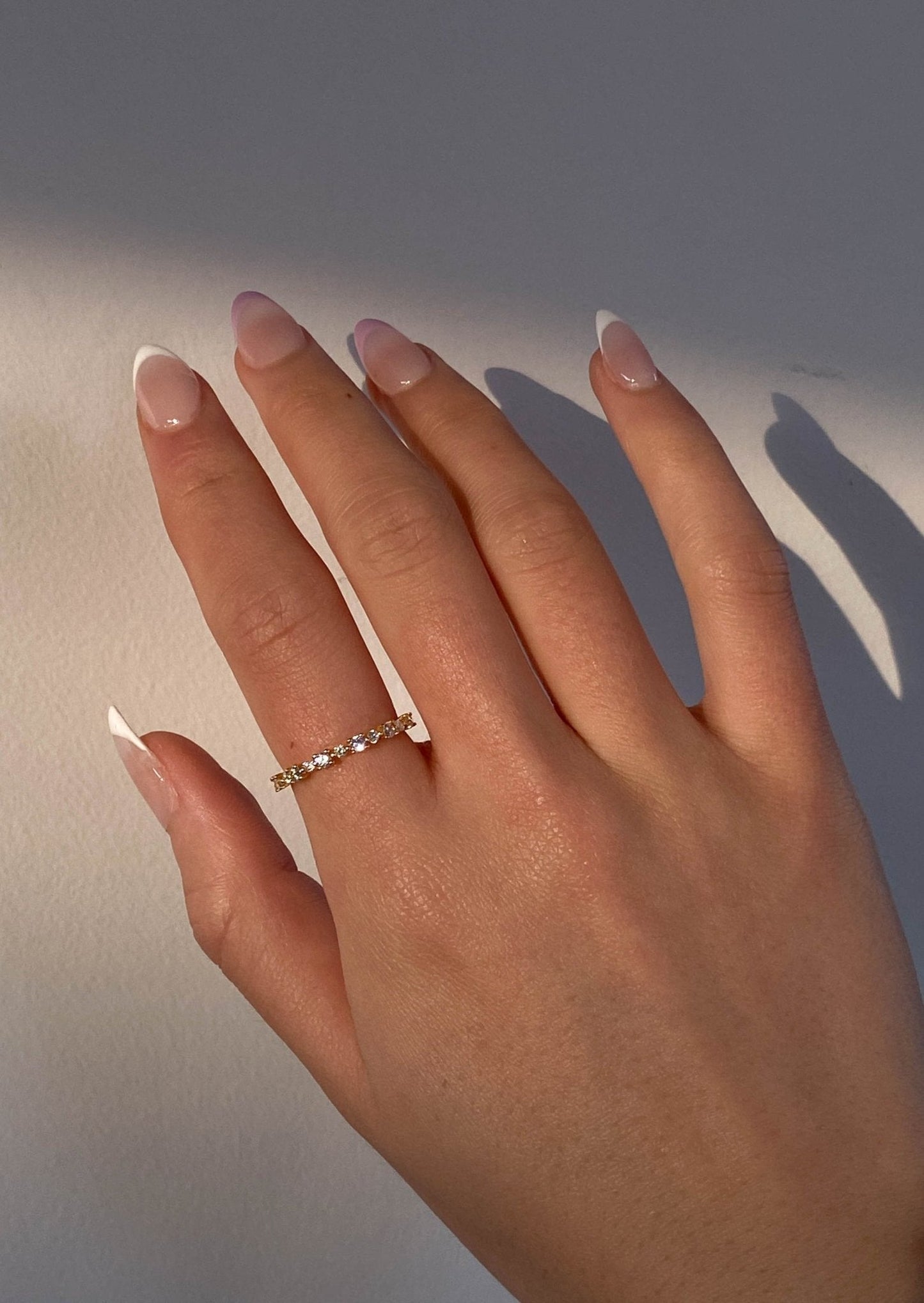 Gold Ring with Graduated Round Stones