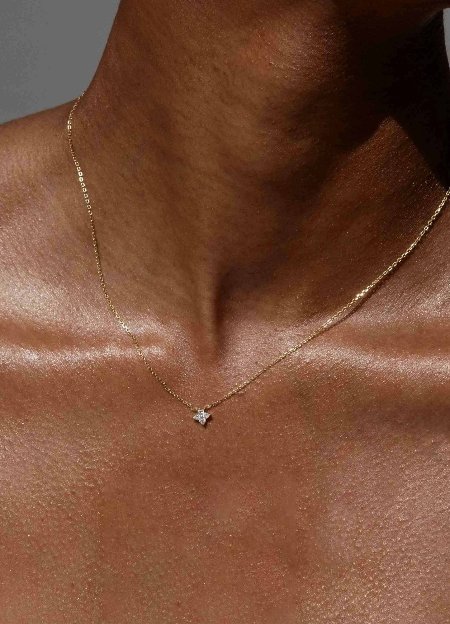 Gold-Toned Chain Necklace with Four-Stone Floral Pendant