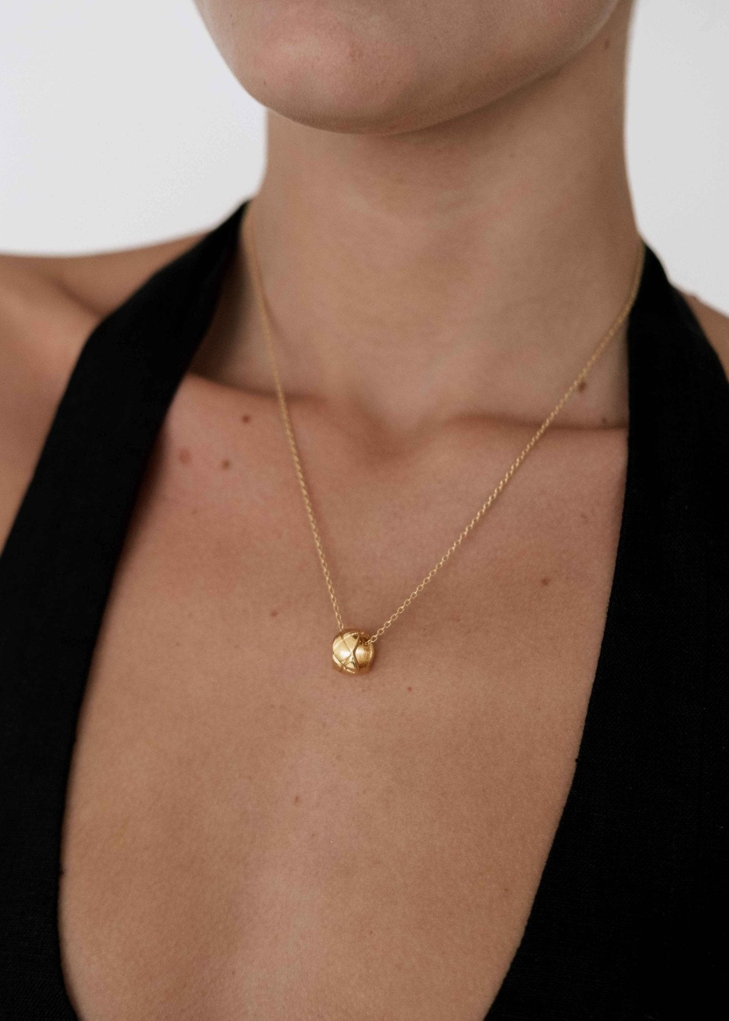 Gold Necklace with Textured Barrel Pendant