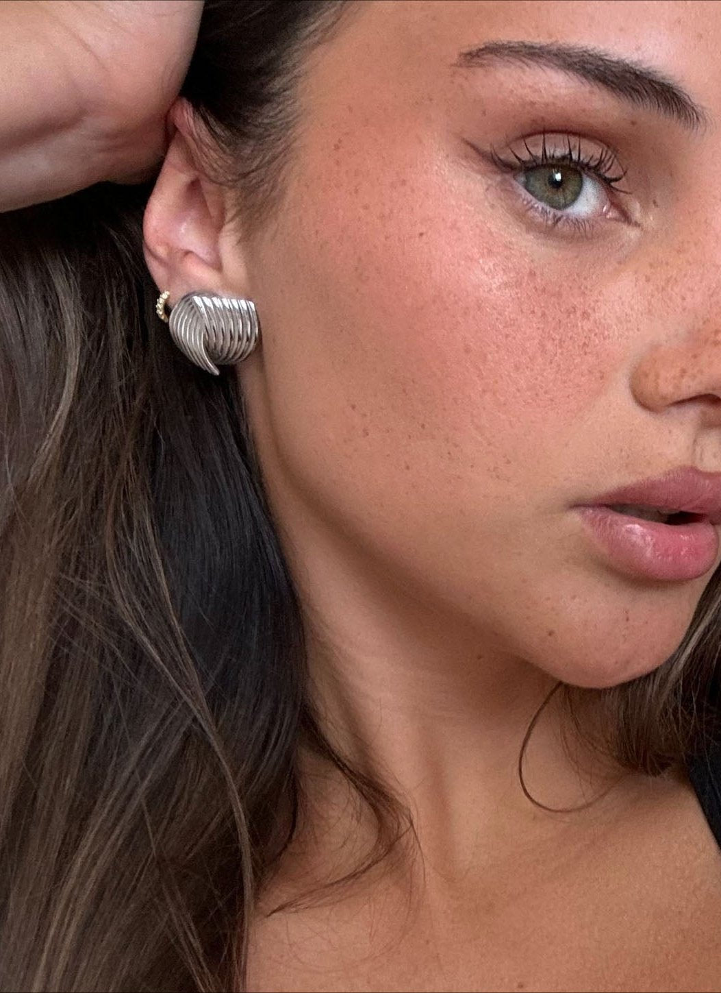 Silver Sculpted Swirl Stud Earrings – Textured Retro Design