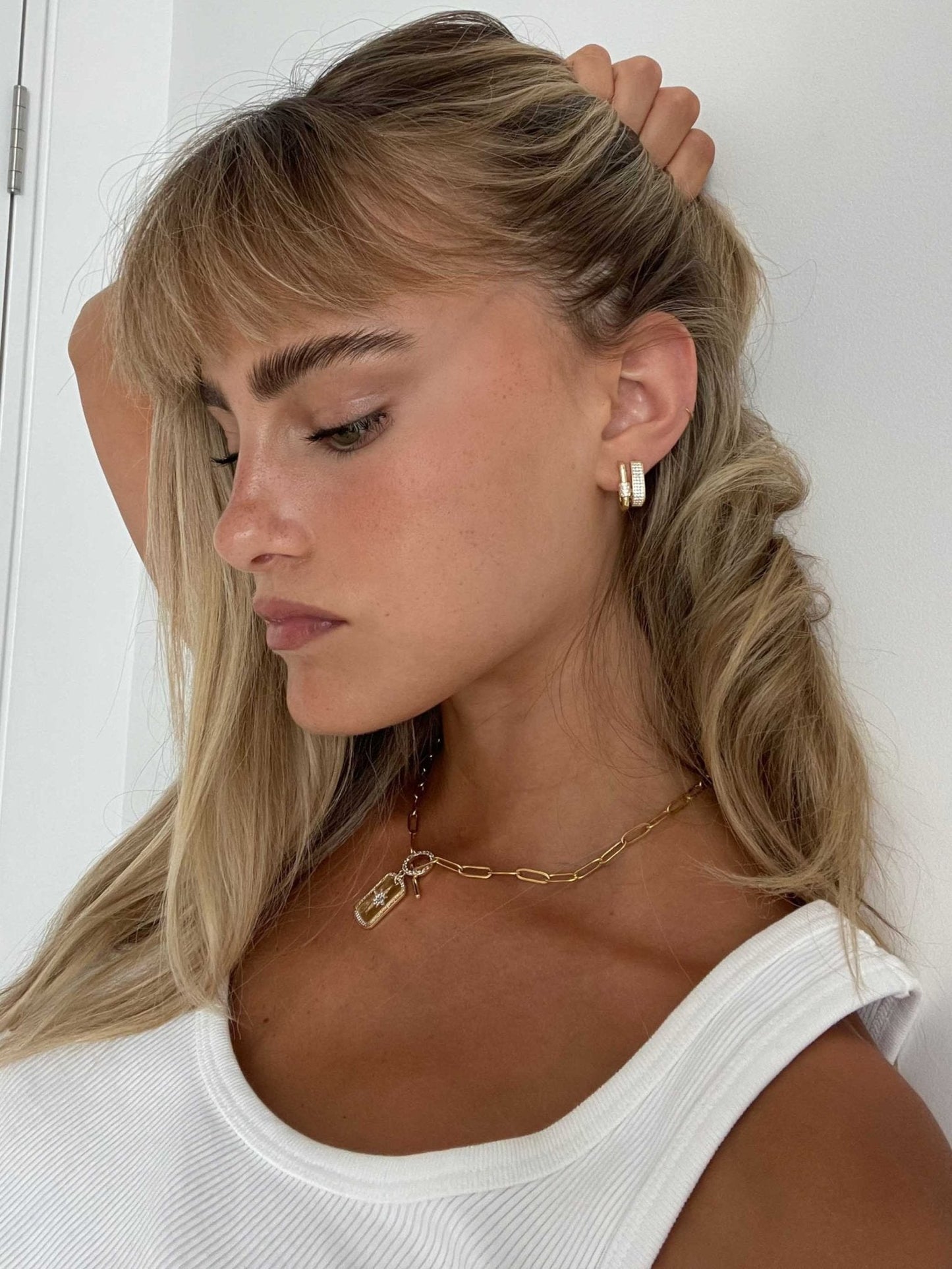 Gold Rectangular Huggie Earrings with Pave Crystals – Elegant Sparkling Hoop Design