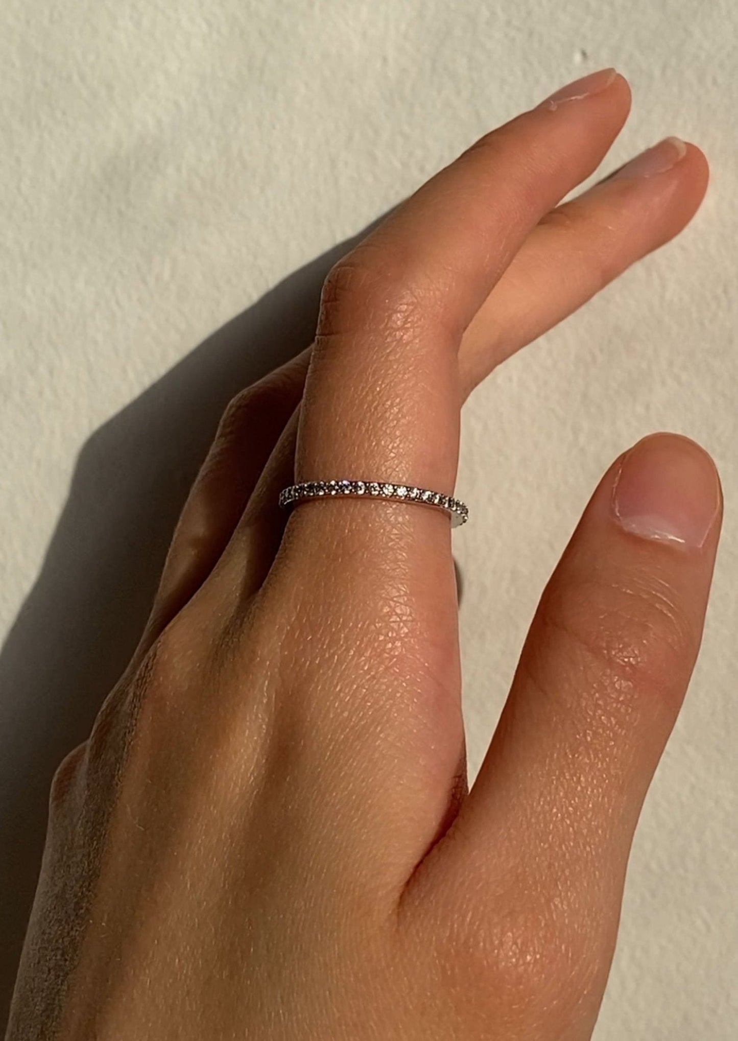 Slim Silver-Tone Eternity Ring with Clear Round Stones