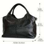 Black leather handbag with measurements indicated on a white background