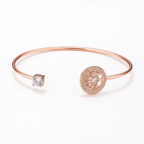 Rose gold bracelet with a tree of life charm and a sparkling diamond accent, elegant jewelry piece, minimalist design, perfect for gifting.