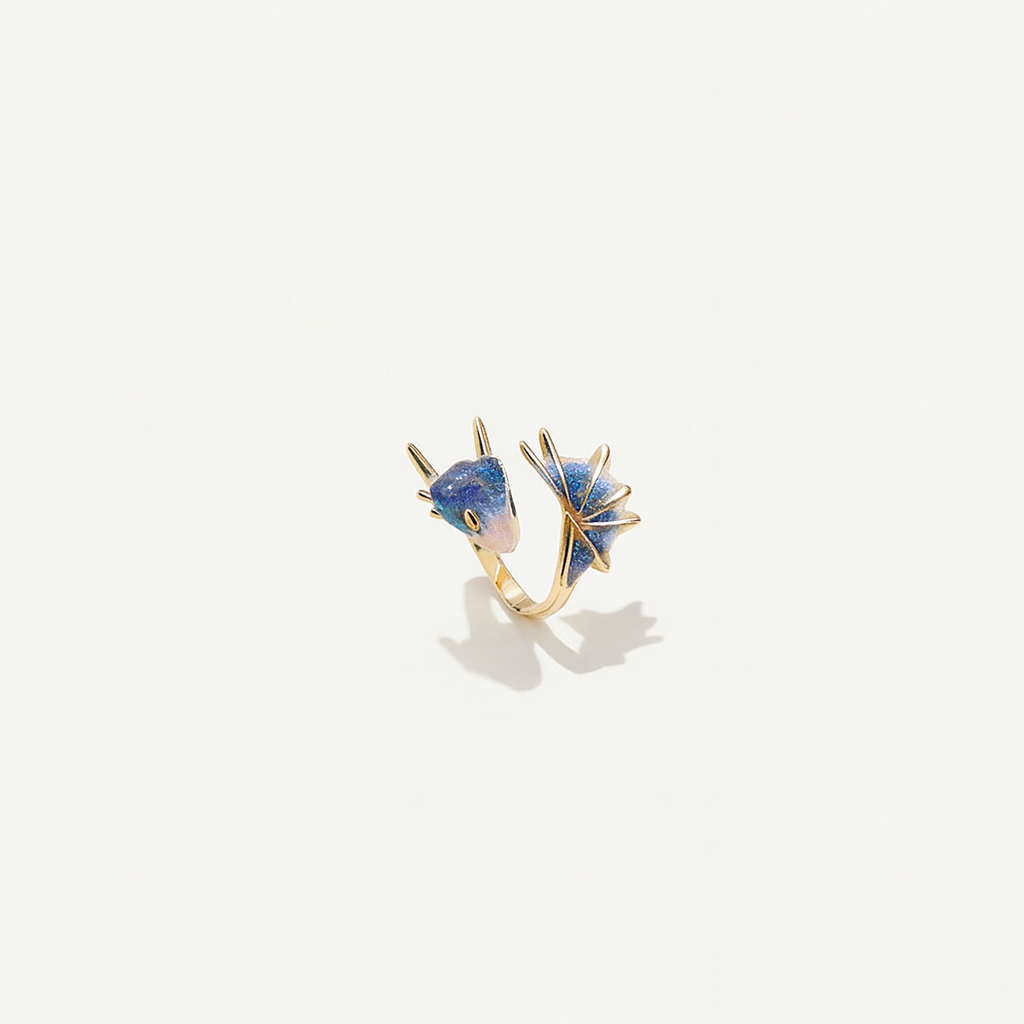 Gold ring with blue enamel fox design, featuring pointed ears and tail. Unique animal jewelry, perfect for fashion accessories and gift ideas.