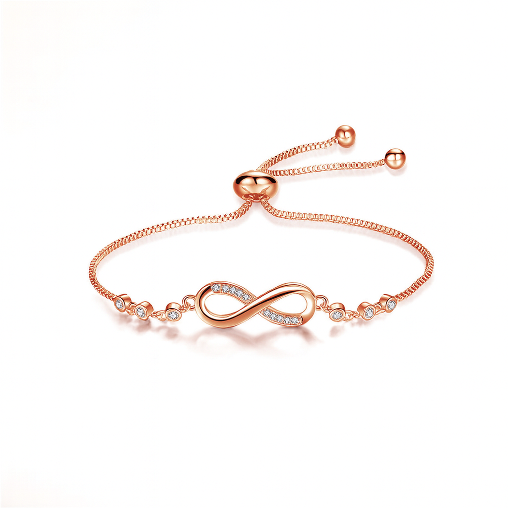 Rose gold infinity bracelet with adjustable chain, adorned with sparkling crystals, elegant jewelry piece, perfect for fashion and gift occasions.