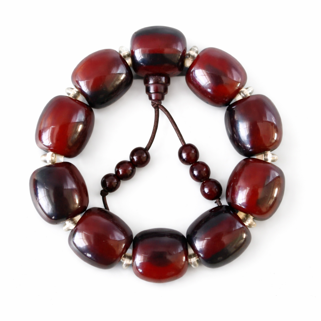 Brown beaded bracelet on a white background