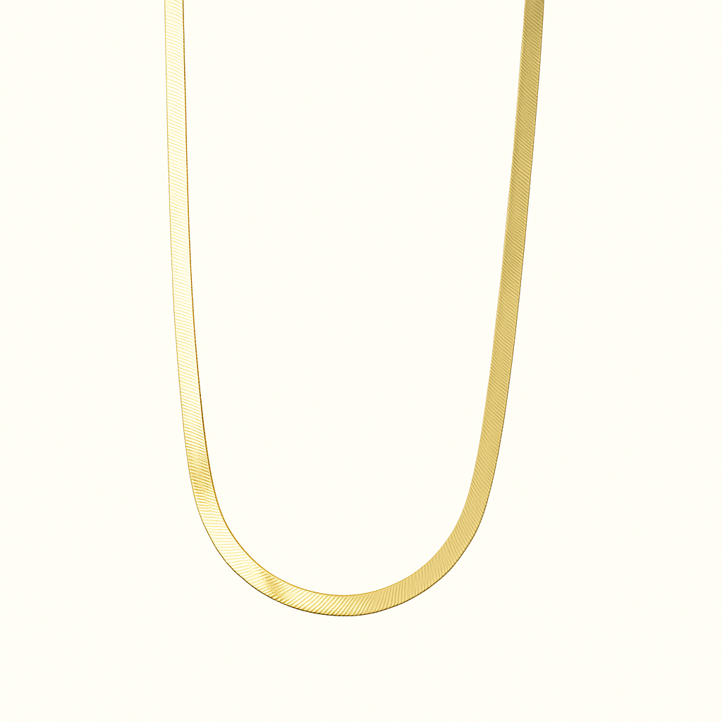 Gold herringbone chain necklace on white background, elegant jewelry piece, perfect for fashion accessories, luxury style, unisex design.