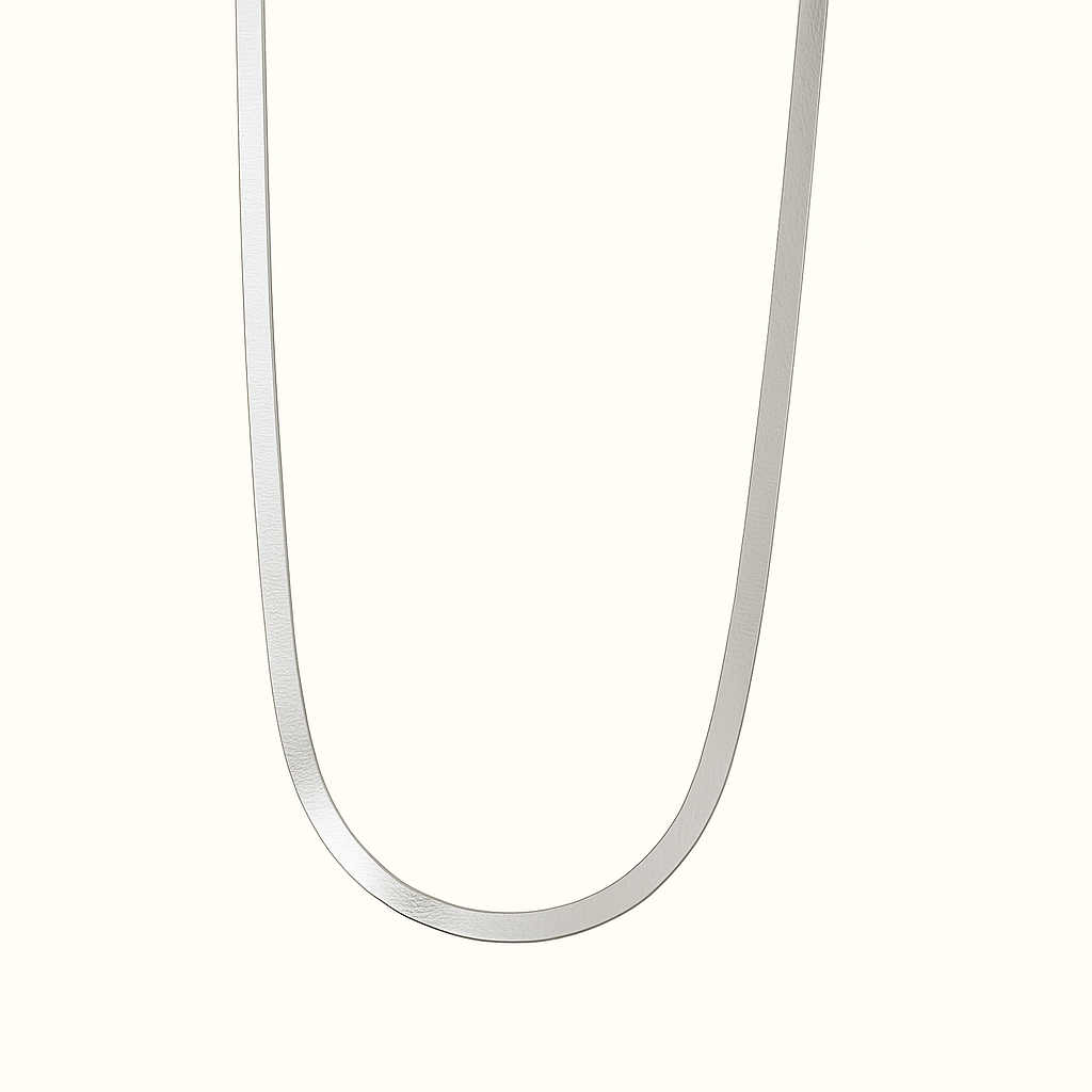 Silver chain necklace with a sleek, minimalist design on a plain background. Perfect for fashion, jewelry, and accessory keywords.