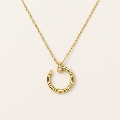 Gold-Tone Necklace with Open Circular Pendant and Stone Detail