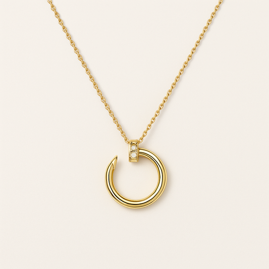 Gold-Tone Necklace with Open Circular Pendant and Stone Detail
