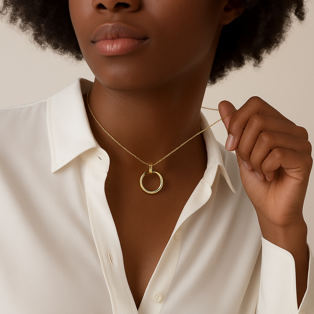 Gold-Tone Necklace with Open Circular Pendant and Stone Detail