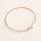 Elegant diamond tennis bracelet with a minimalist design, featuring a delicate gold band and sparkling round-cut diamonds, perfect for luxury jewelry lovers.