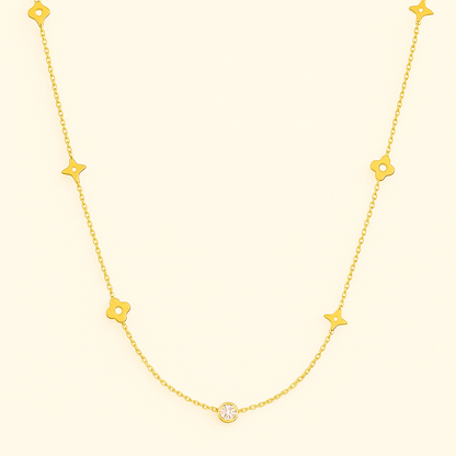 Gold-Tone Necklace with Polished Floral Motifs and Center Crystal Accent