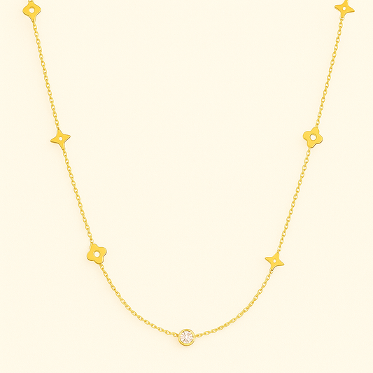 Gold-Tone Necklace with Polished Floral Motifs and Center Crystal Accent