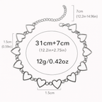 Silver heart-shaped bracelet with measurements on a white background