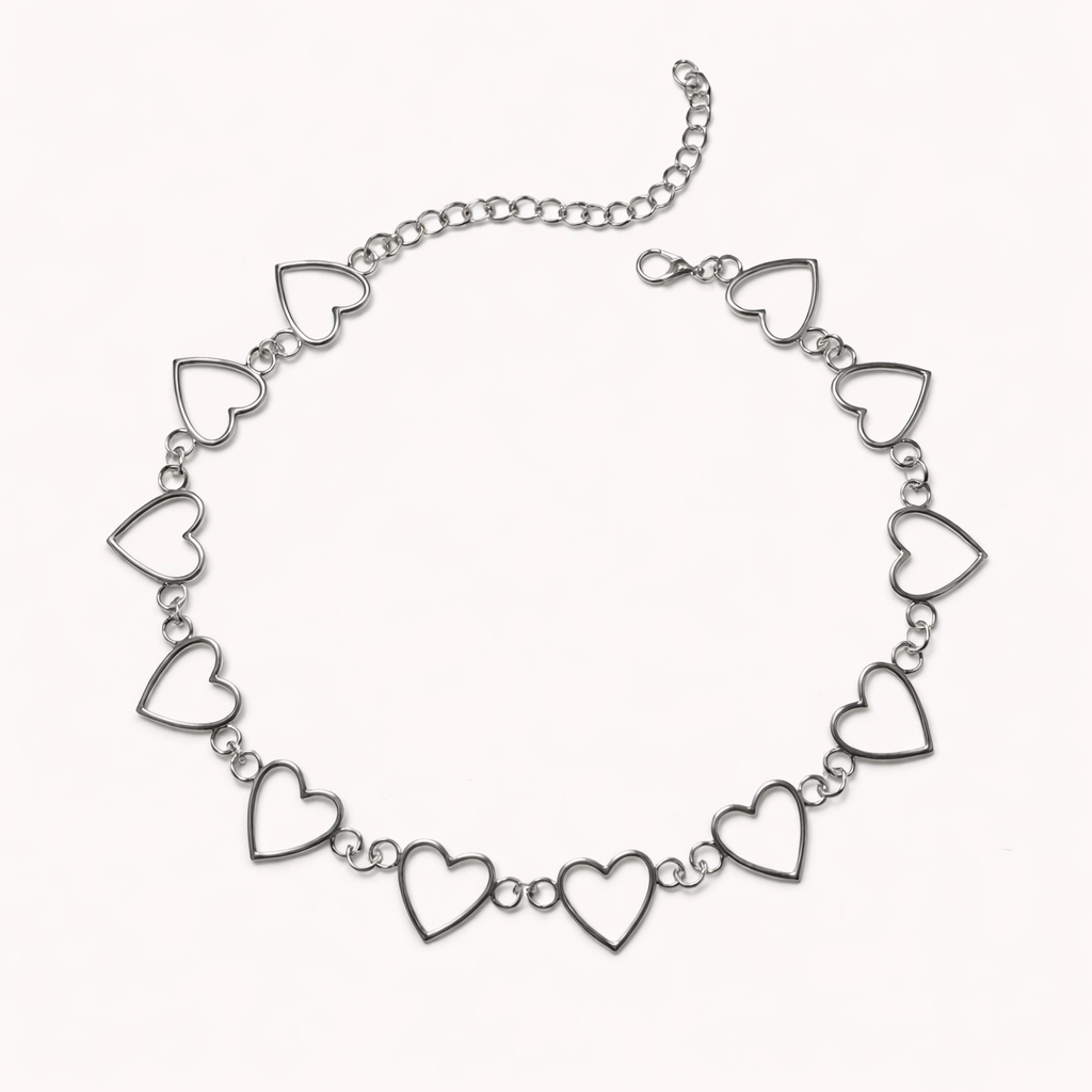 Silver necklace with heart-shaped links on a white background