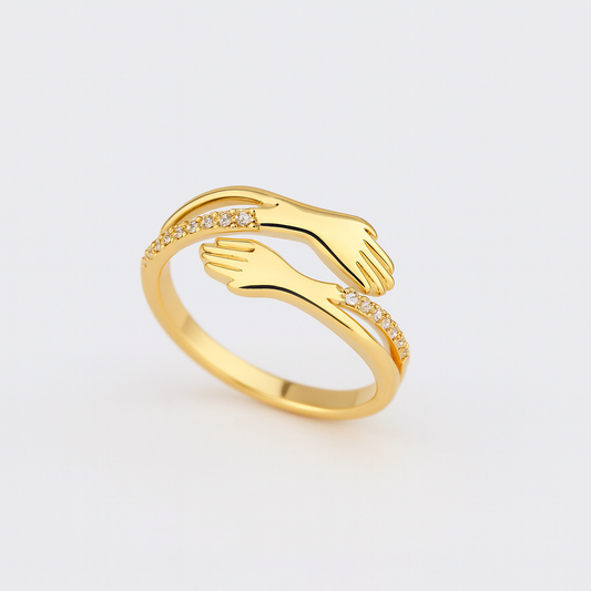 Gold ring with hand design, adorned with sparkling diamonds. Elegant jewelry piece, perfect for fashion accessories, luxury gifts, or engagement rings.