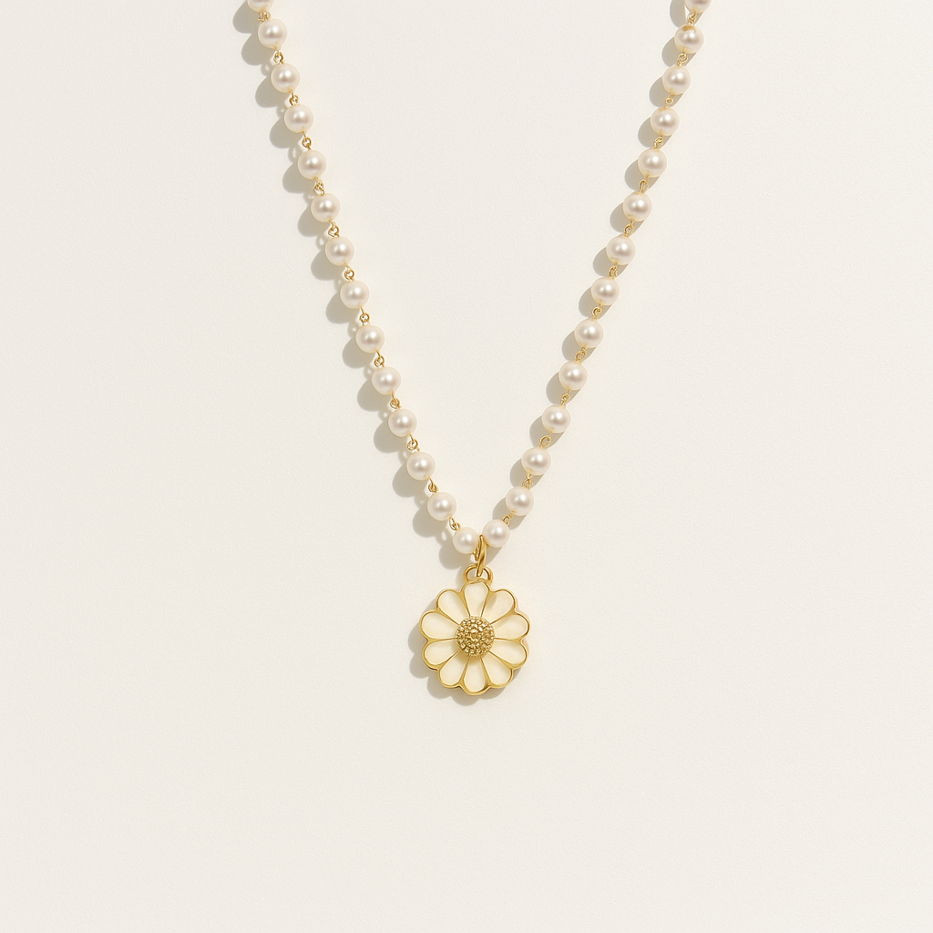Pearl necklace with gold daisy pendant, elegant jewelry, luxury fashion accessory, classic pearl strand, floral charm, sophisticated style.
