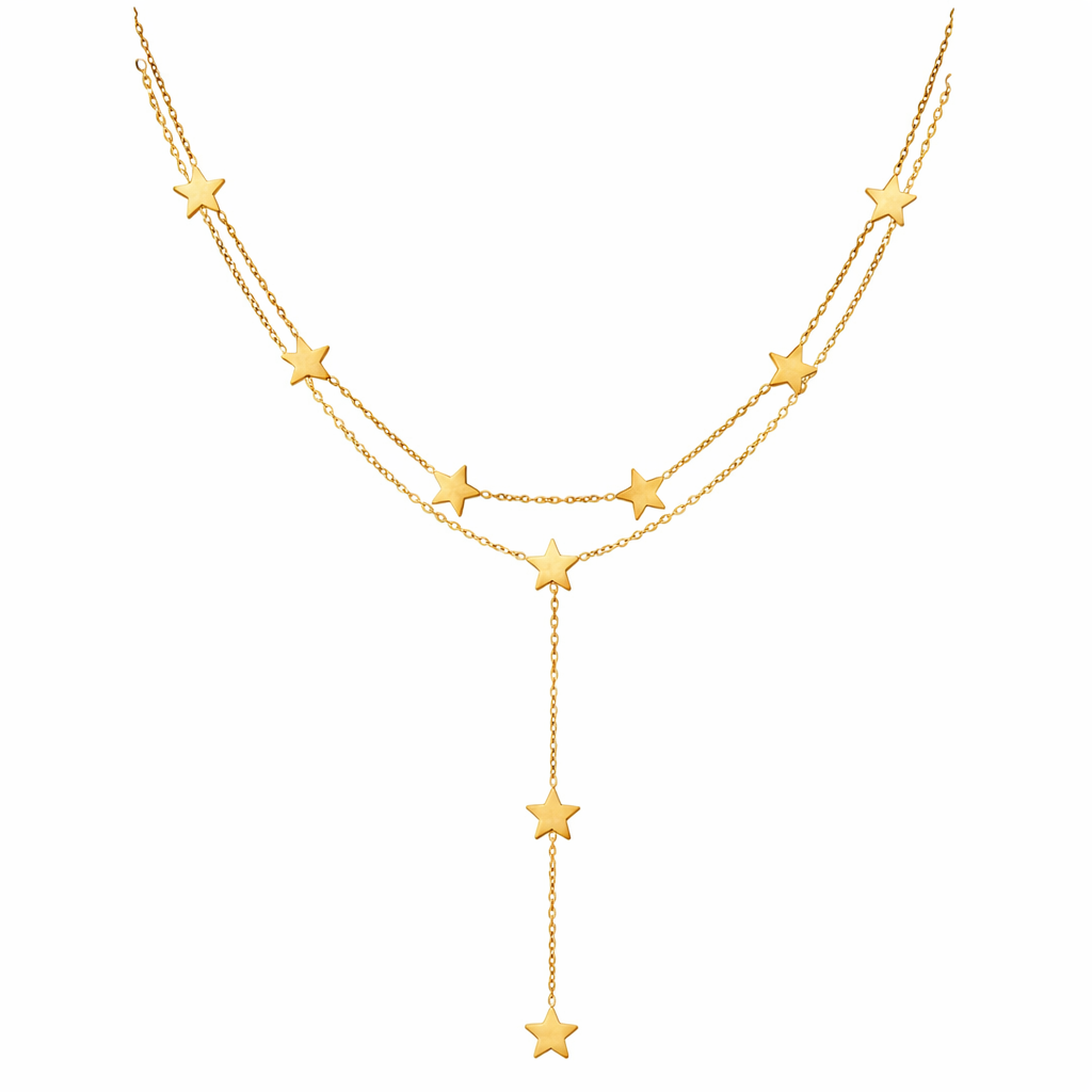 Gold star necklace on a white background