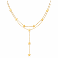 Gold star necklace on a white background