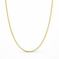 Gold chain necklace on a white background
