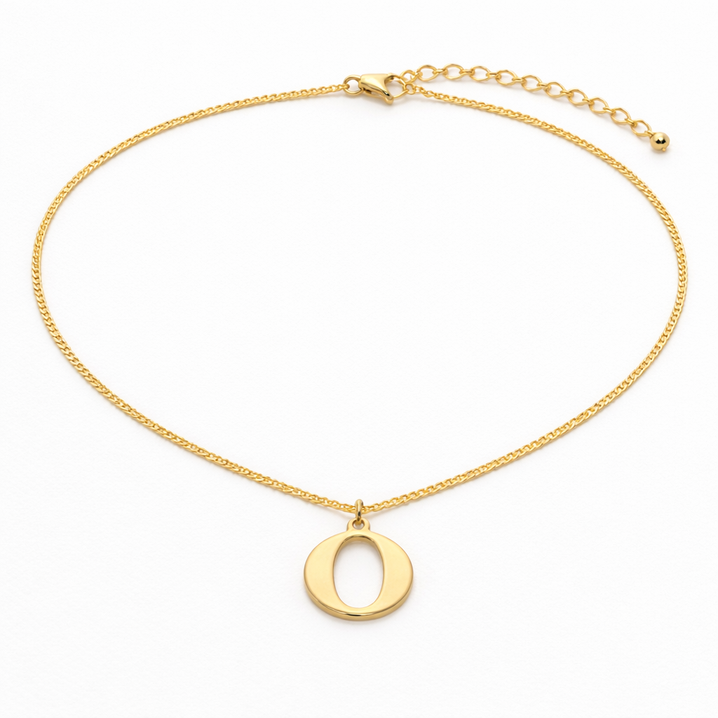 Gold necklace with a 'O' pendant on a white background