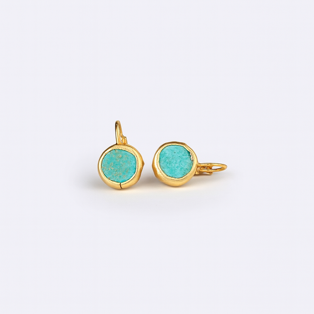 Gold earrings with round turquoise stones, minimalist design, elegant jewelry, perfect for casual or formal wear, stylish accessory for women.