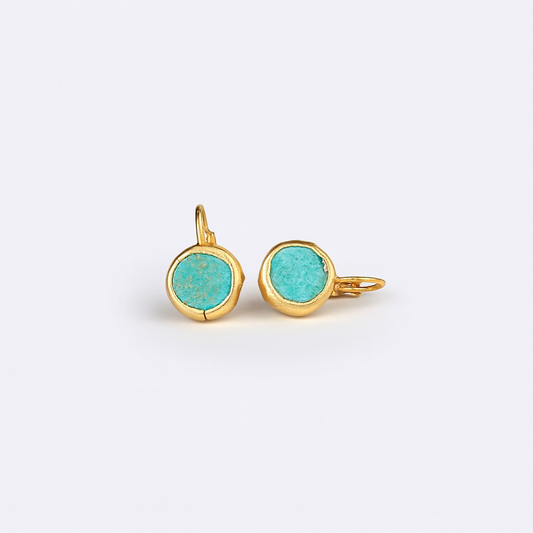 Gold earrings with round turquoise stones, minimalist design, elegant jewelry, perfect for casual or formal wear, stylish accessory for women.