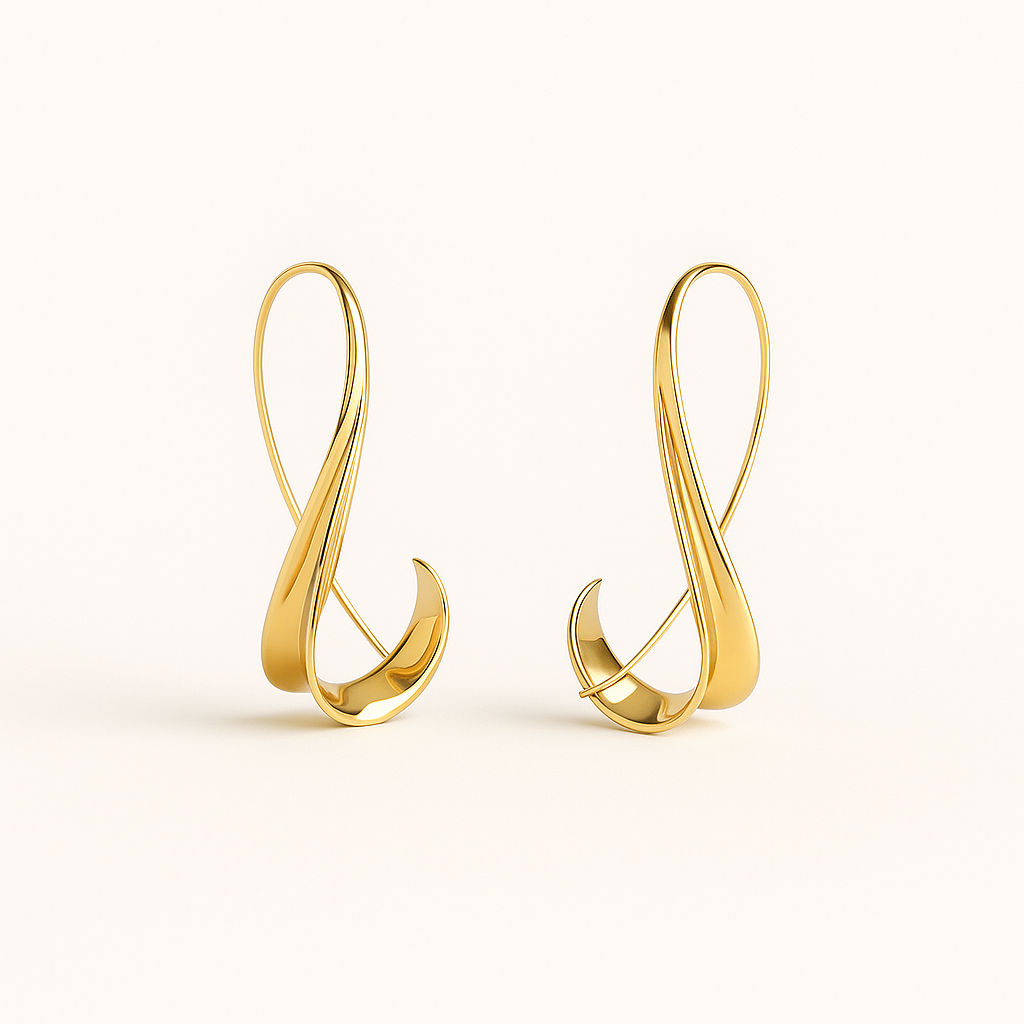 Gold earrings on a white background