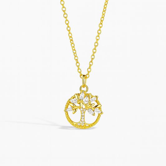Gold tree of life pendant necklace with diamond accents on a delicate chain, symbolizing growth and strength. Elegant jewelry for women.