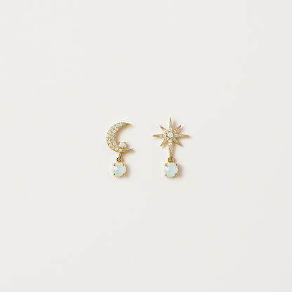 Gold moon and star earrings with opal gemstones, featuring a crescent moon and starburst design, perfect for celestial-themed jewelry lovers.