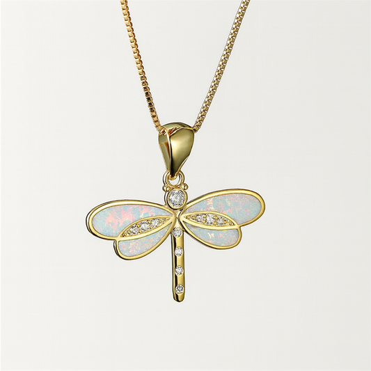 Gold dragonfly pendant necklace with opal inlay and diamond accents on a delicate chain, elegant jewelry design, perfect for fashion accessories.
