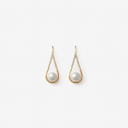 Elegant gold teardrop earrings with pearls and diamond accents, luxury jewelry, fashion accessories, sophisticated design, women's earrings.
