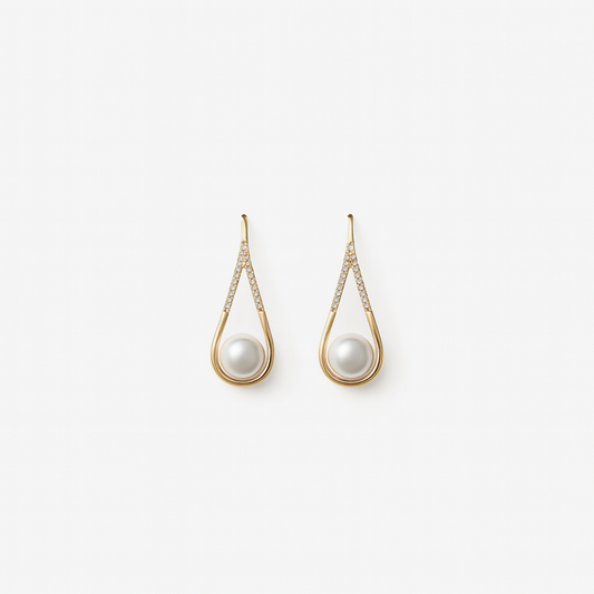 Elegant gold teardrop earrings with pearls and diamond accents, luxury jewelry, fashion accessories, sophisticated design, women's earrings.