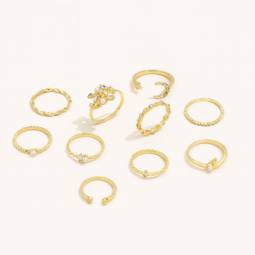 Elegant gold rings collection with intricate designs and gemstone accents, featuring stackable and adjustable styles on a light background.