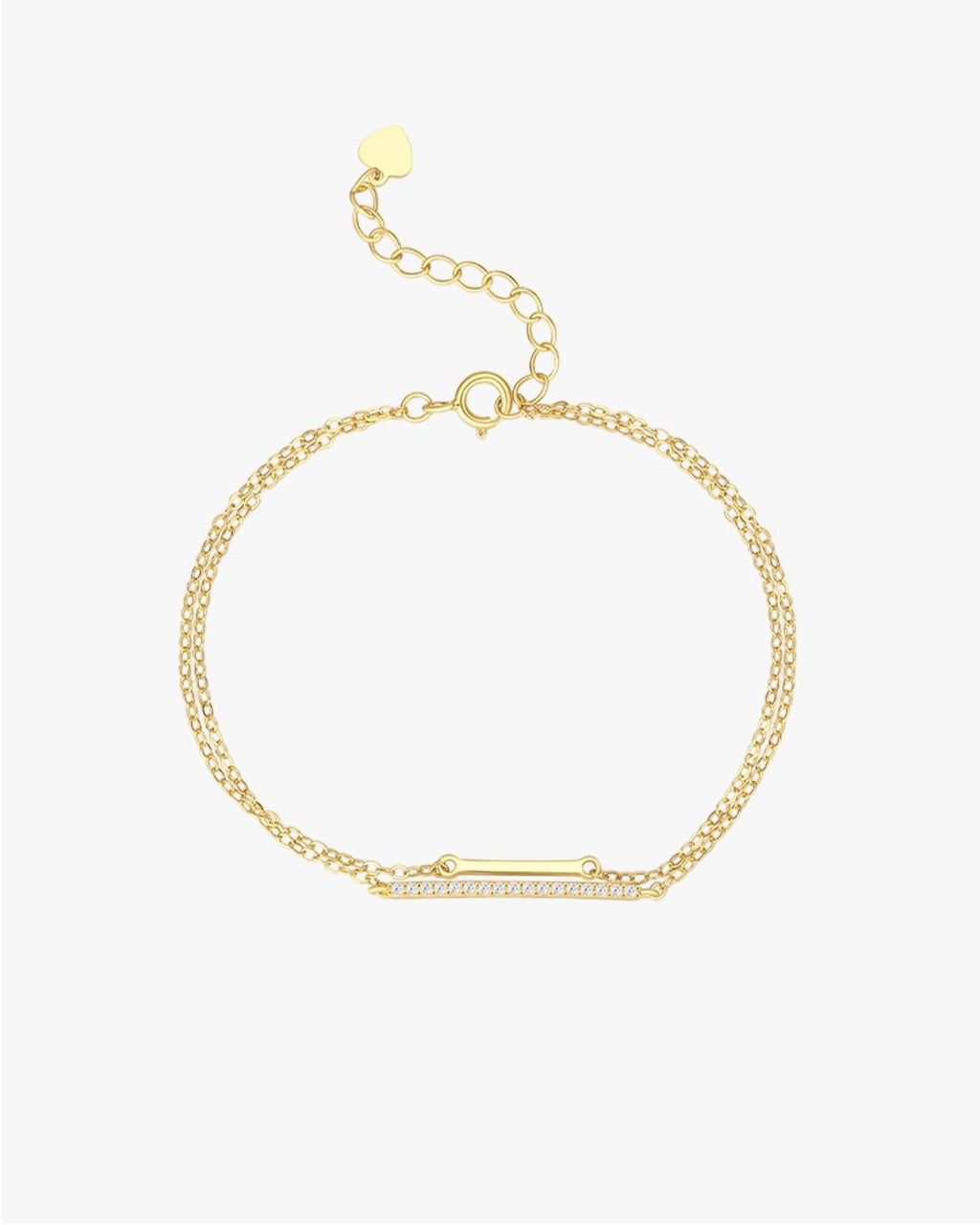 Gold double-chain bracelet with a rectangular diamond-studded bar and adjustable heart-shaped clasp. Elegant jewelry accessory.