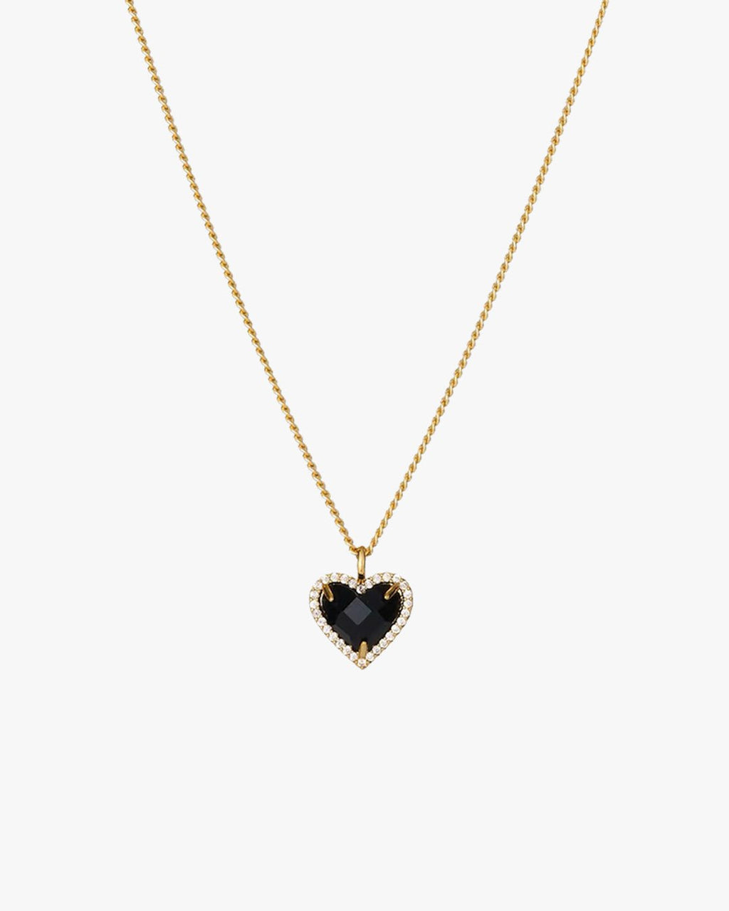 Gold chain necklace with a heart-shaped black gemstone pendant, surrounded by small clear crystals, on a white background. Elegant jewelry accessory.