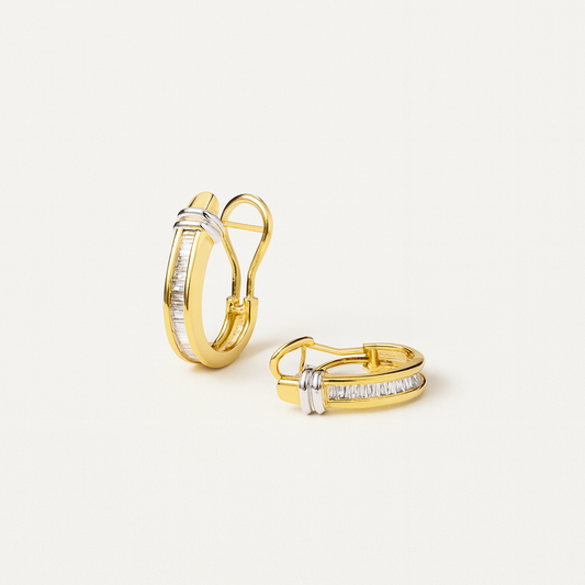 Gold hoop earrings with baguette-cut diamonds and silver accents, elegant jewelry design, luxury accessories, perfect for formal occasions.