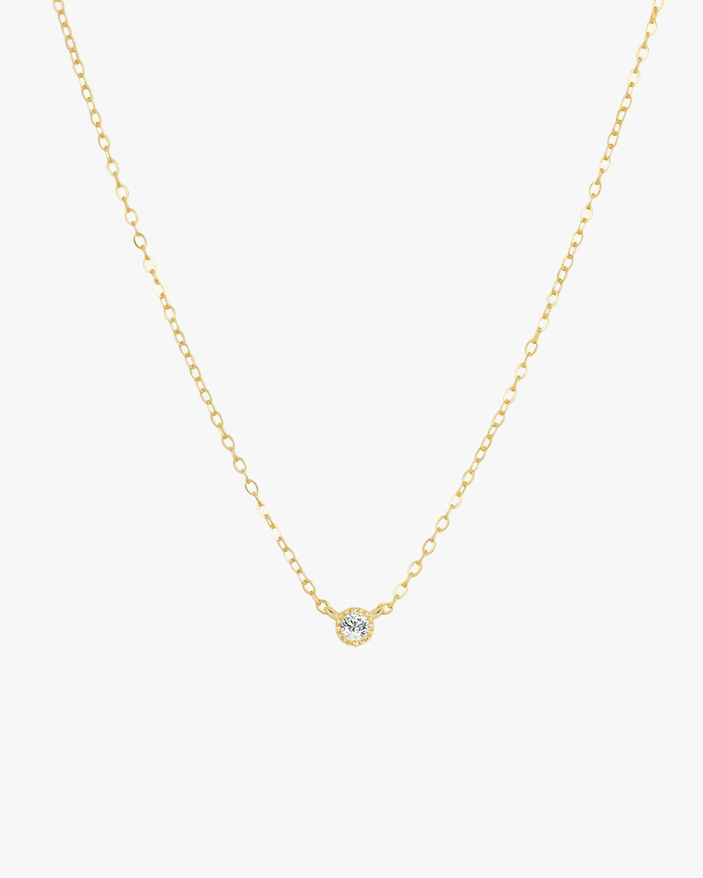 Gold chain necklace with a single diamond pendant, minimalist jewelry design, elegant and simple accessory for women, perfect for everyday wear.