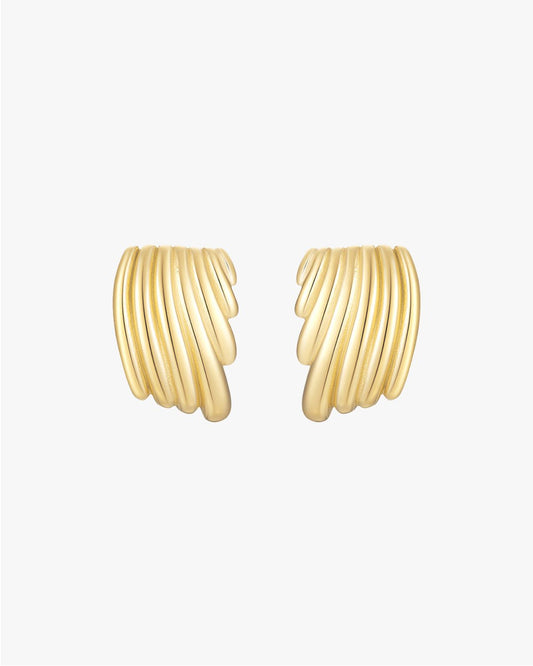 Gold ribbed hoop earrings on white background, elegant jewelry, textured design, fashion accessories, women's gold earrings, stylish statement piece.